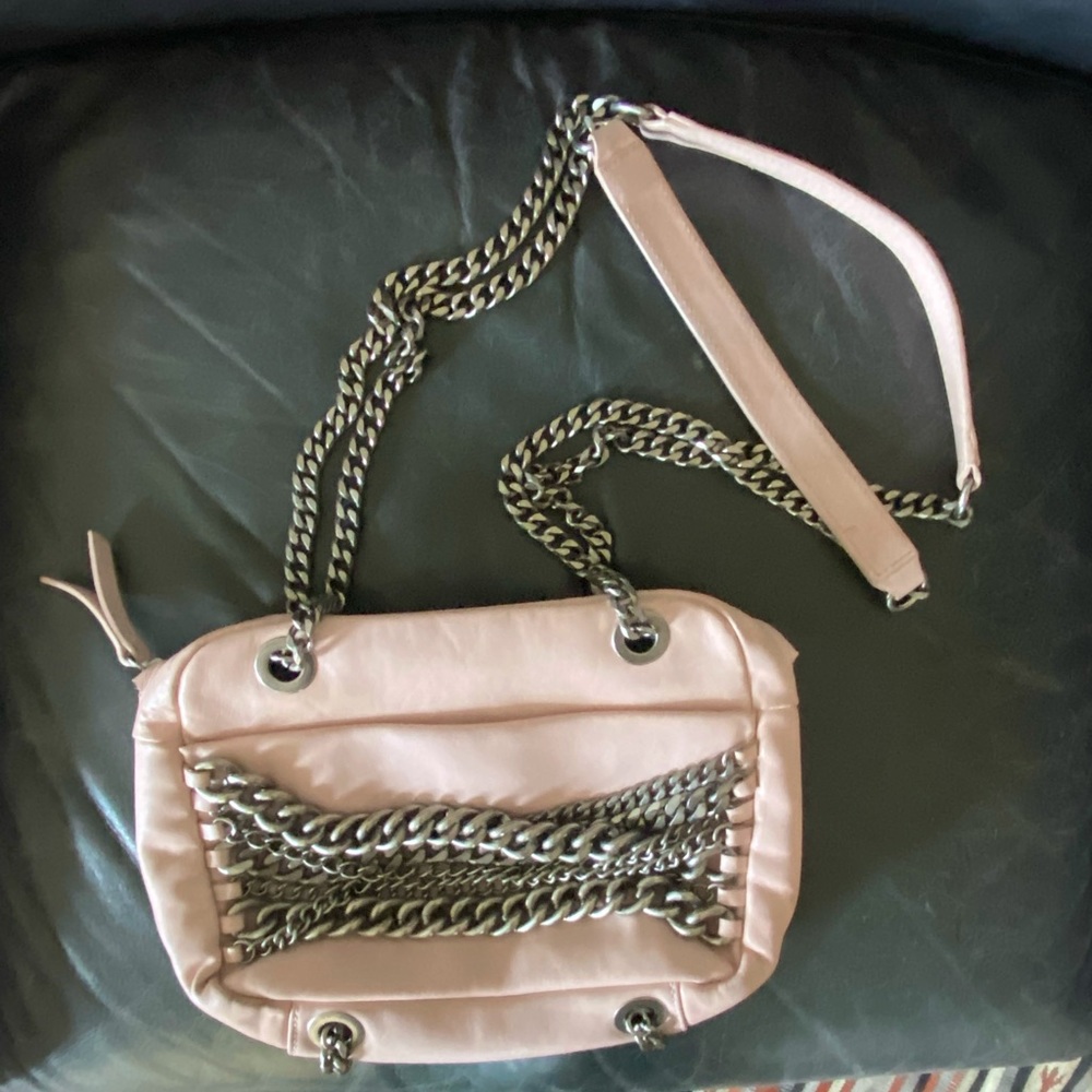 Zara light pastel pink purse. Chains across front & for strap.